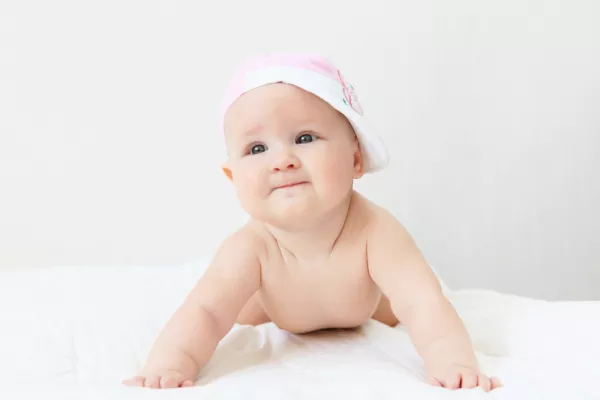 Portrait Of A Young Child On A White Background Baby