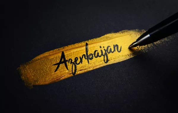 Azerbaijan Handwriting Text Golden Paint Brush Stroke