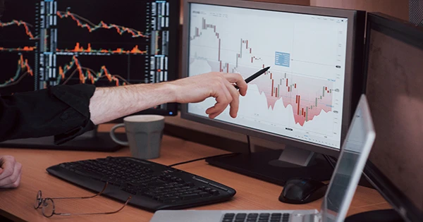 Analyzing Data Close Up Young Businessman Pointing Data Presented Chart With Pen While Working Creative Office